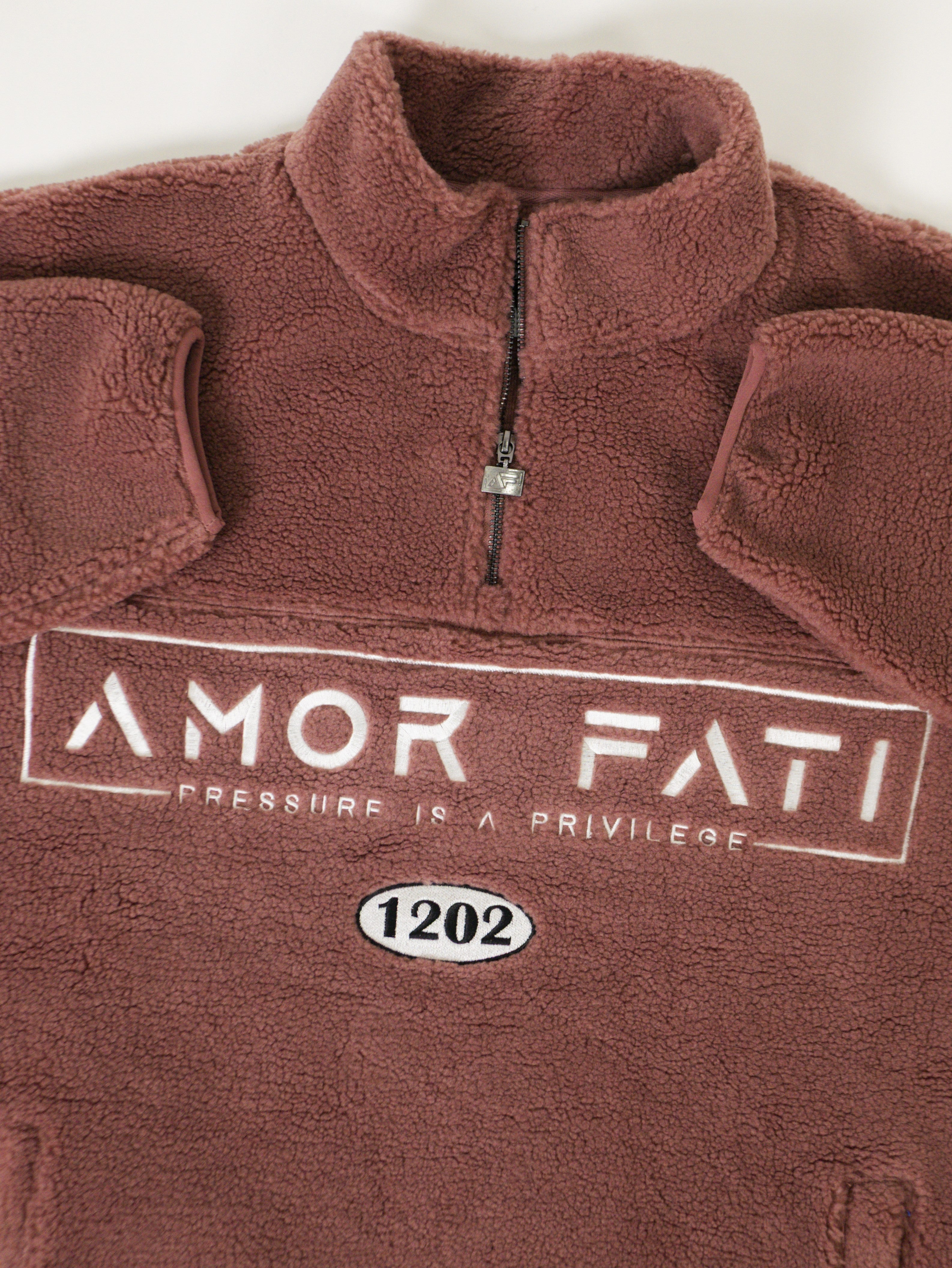 'AMOR FATI' Pastel Rose Gold Unisex Quarter Zip