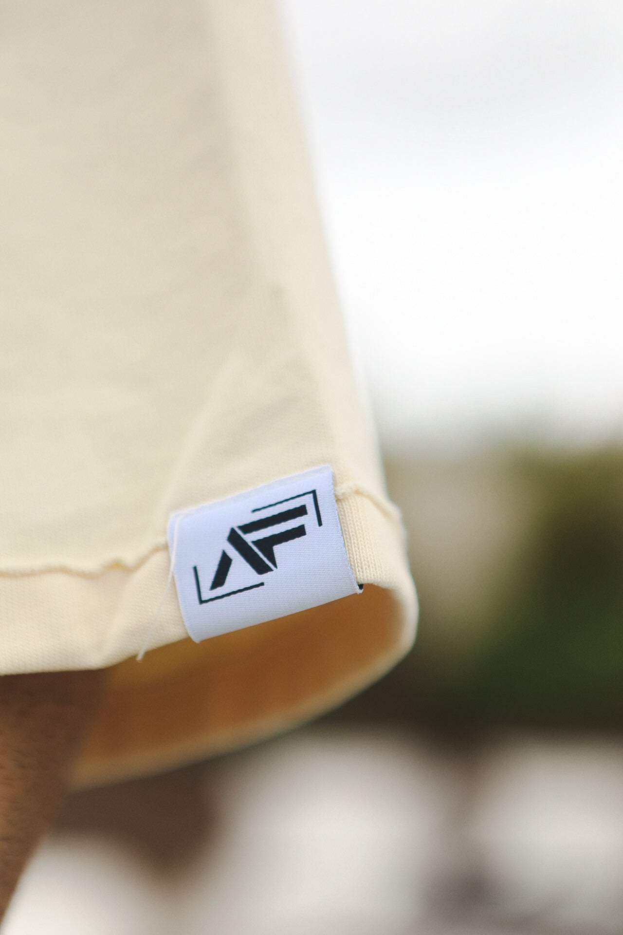 ‘AMOR FATI’ Unisex Box Cropped Tee Ecru White Colorway